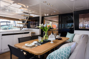 The best of Croatia luxury sailing catamaran Lagoon 620, cockpit with teak dining table, outdoor sink and fridge.